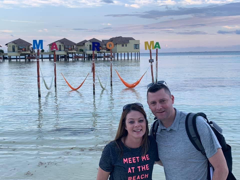 Chris with her husband in Riviera Maya